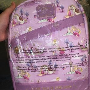 Tangle loungefly backpack.